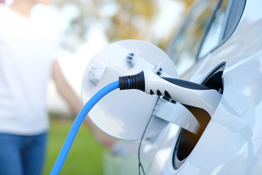 ev-charger Picture of EV charger plug charging car