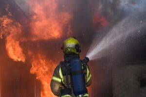 Firefighters trying to put out house on fire